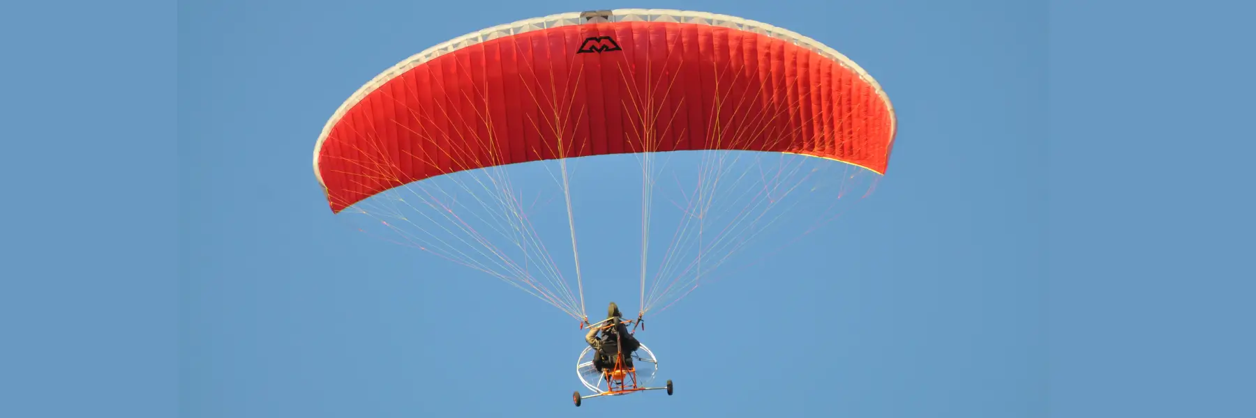 Paramotoring in Rishikesh — powered paragliding experience with a motor on your back